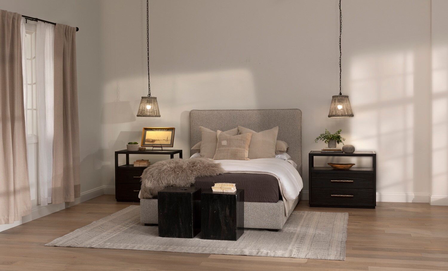 An upholstered bed in a bedroom